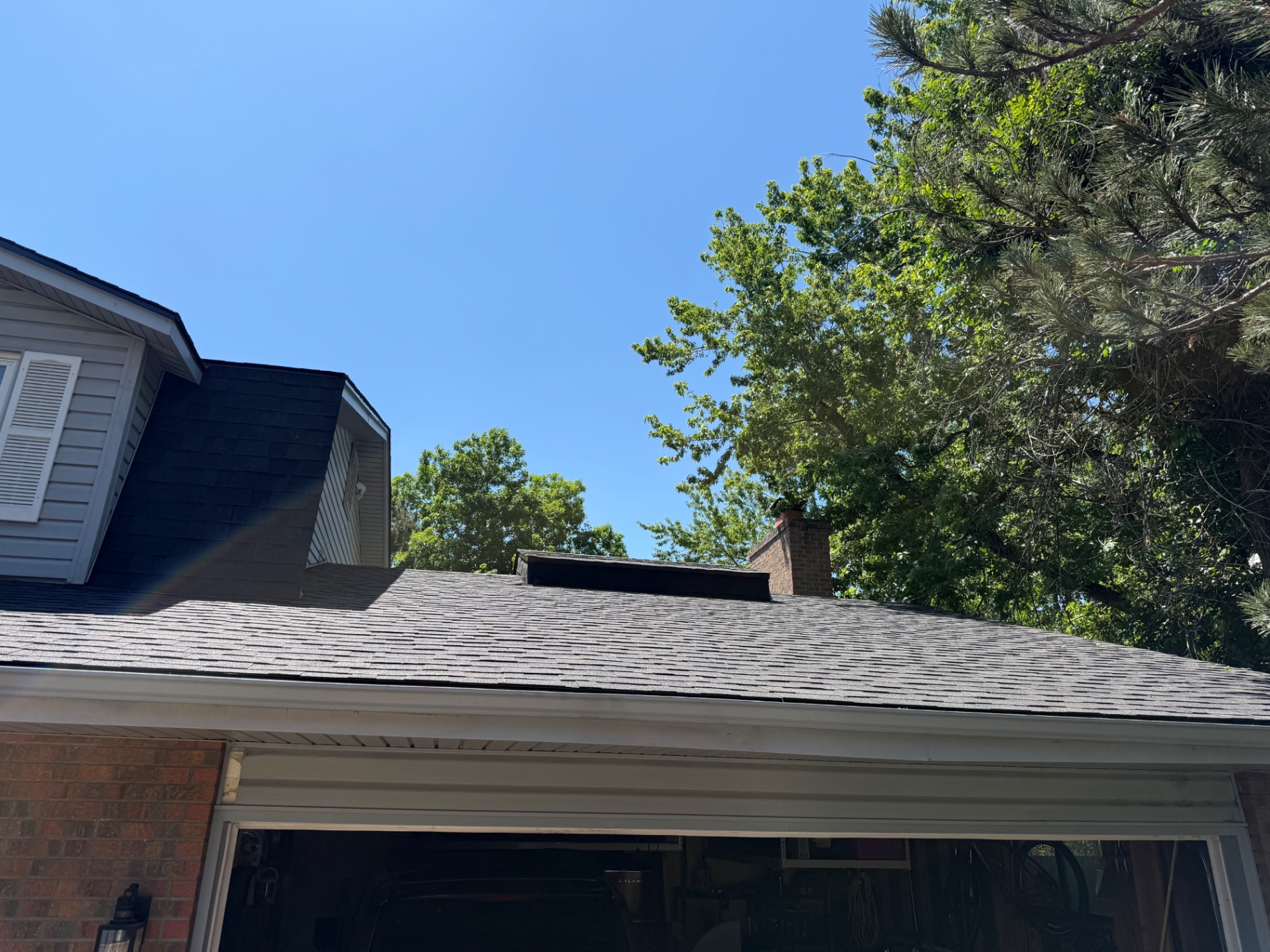Finished roof line and ridge detail on Centennial home after replacement