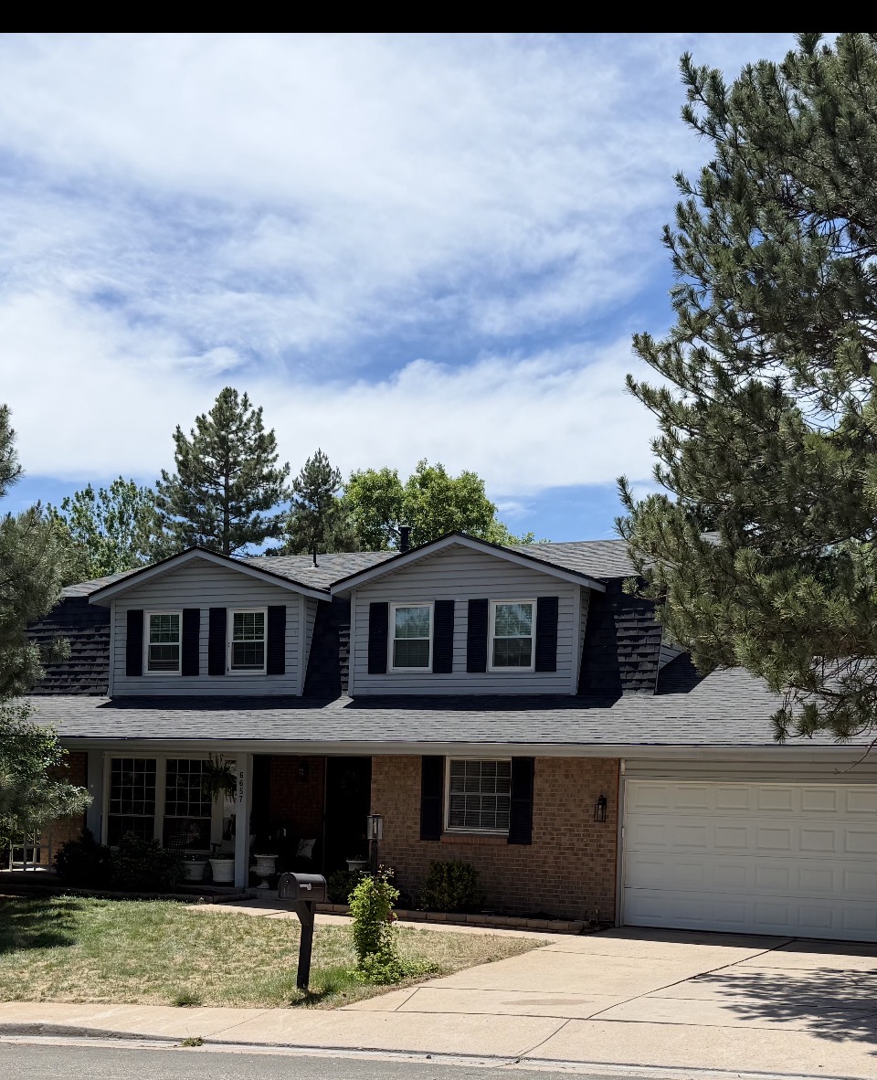 Completed Centennial home after roof replacement with new shingles